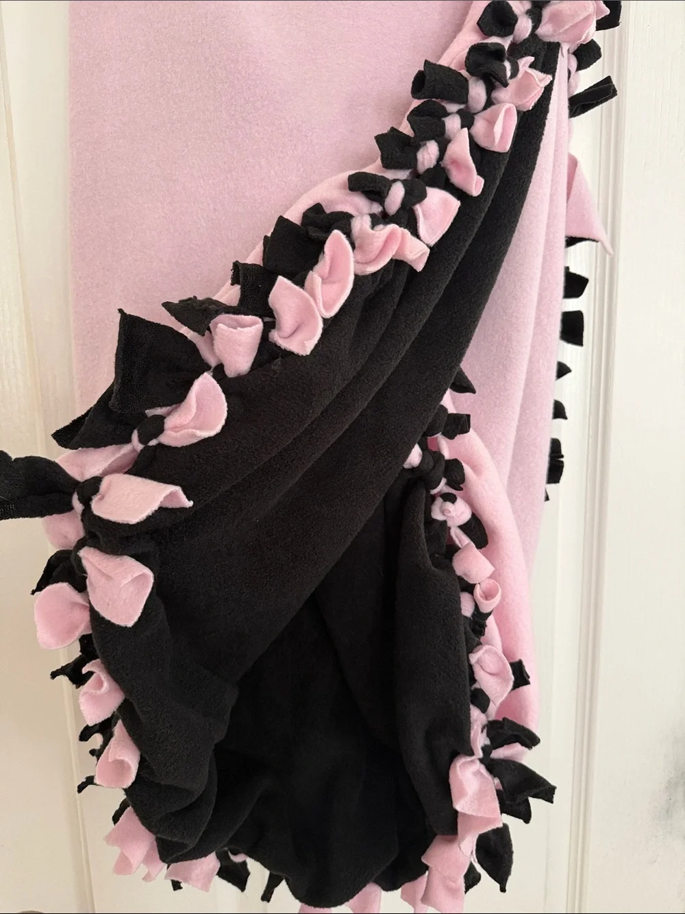 Reversible Black and Pale Pink Fleece Tie-Edge Blanket